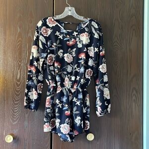 One❤️Clothing navy blue floral long sleeved romper. Size XS. Open V in the back.